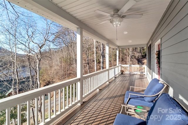 wooden terrace with ceiling fan