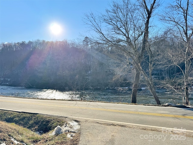 view of road featuring a water view