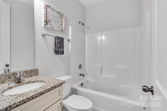 full bathroom with vanity, toilet, and tub / shower combination