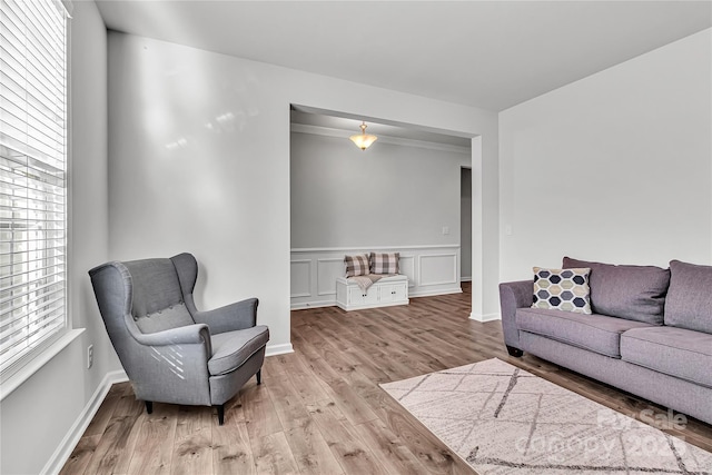 living room with light hardwood / wood-style flooring