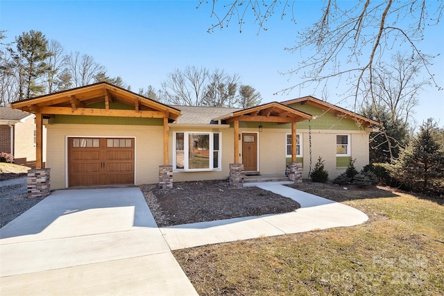 view of front of home with a garage