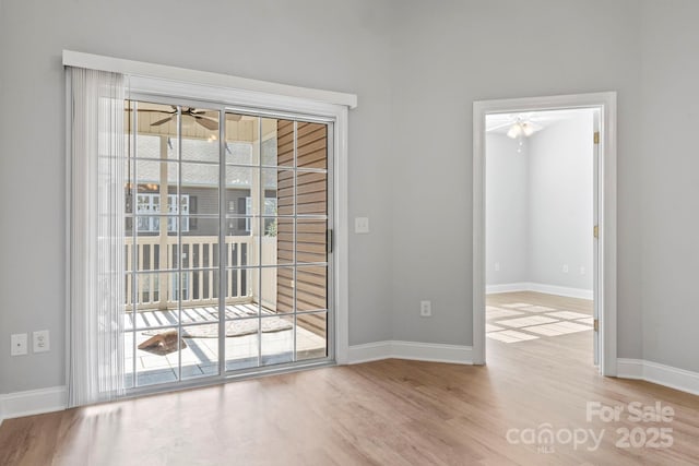 entryway featuring light hardwood / wood-style flooring and ceiling fan