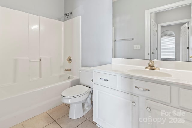 full bathroom featuring tile patterned flooring, vanity, toilet, and bathtub / shower combination