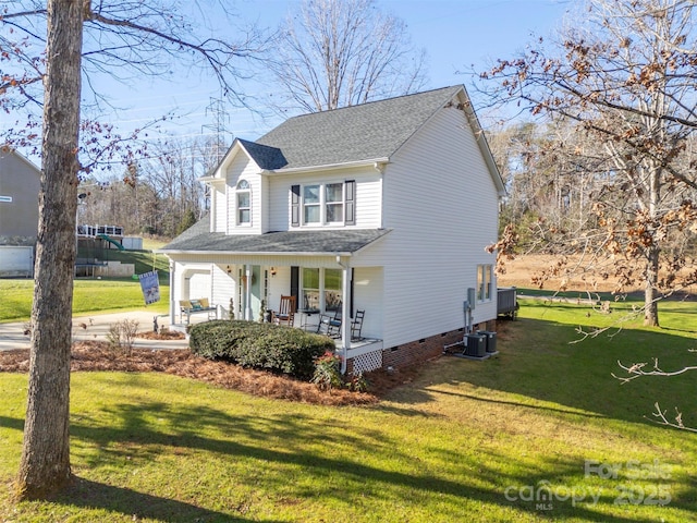 view of front of property with a front yard and a porch