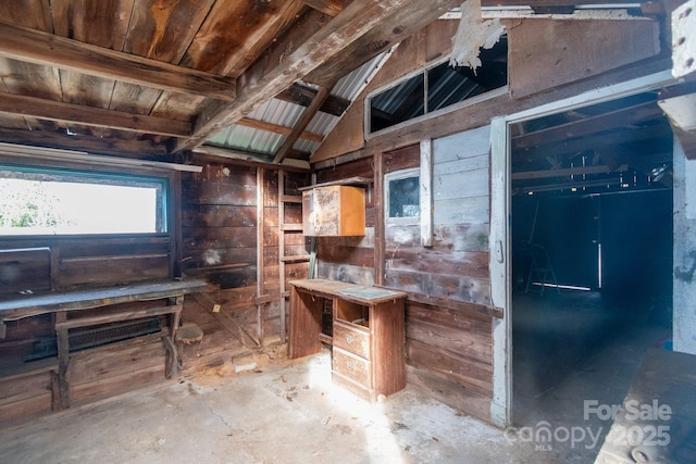 miscellaneous room featuring wood ceiling, wooden walls, and vaulted ceiling