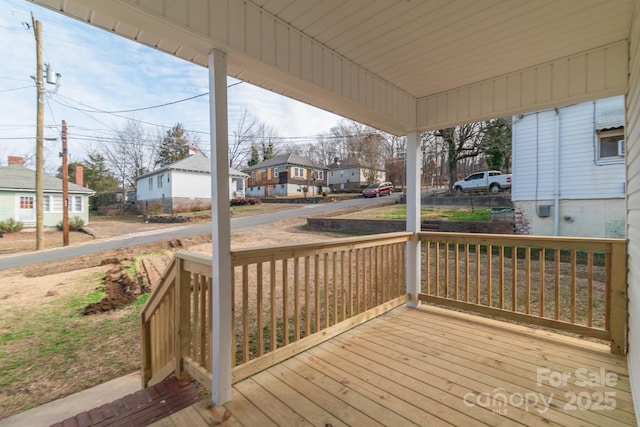 wooden terrace featuring a porch