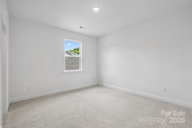 143 Cherry Springs Ln Unit 13-C, Asheville, NC 28804 - empty room featuring baseboards and light colored carpet
