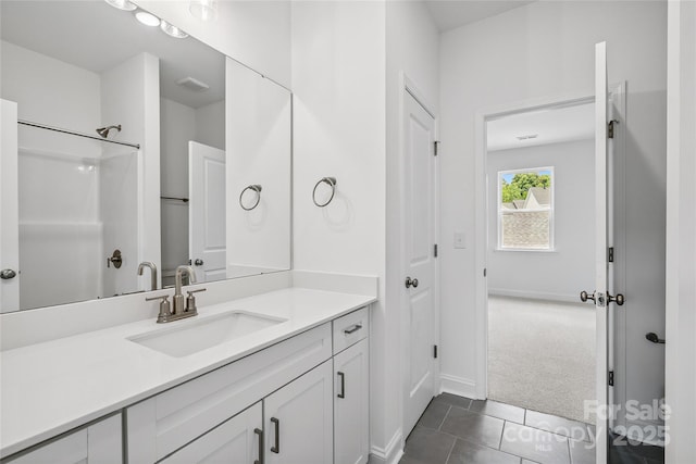 143 Cherry Springs Ln Unit 13-C, Asheville, NC 28804 - bathroom with vanity, tile patterned flooring, and a shower