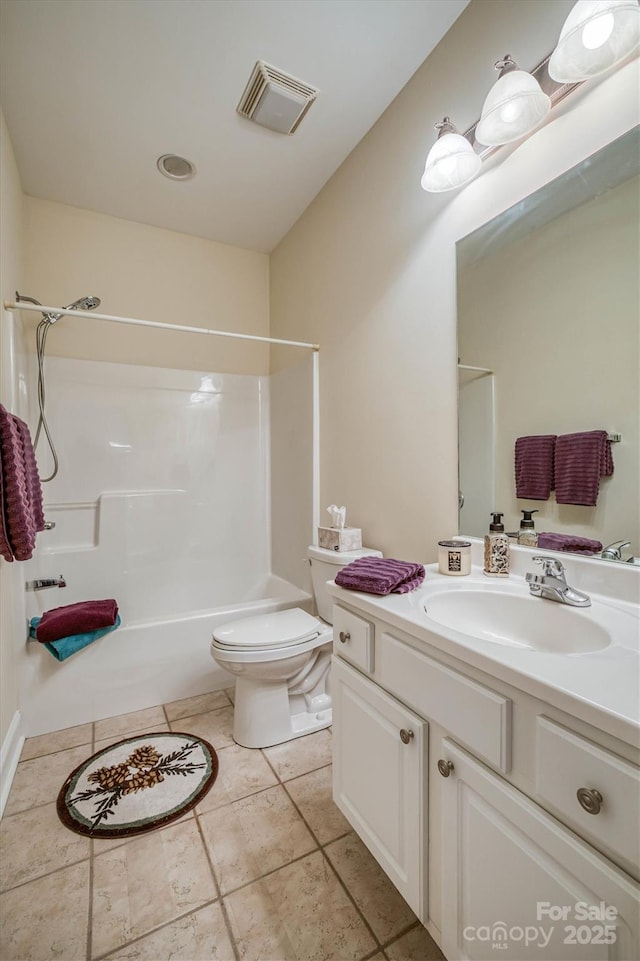 full bathroom with tile patterned floors, vanity, shower / bathtub combination, and toilet