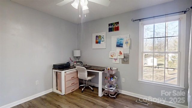 home office featuring ceiling fan and dark hardwood / wood-style floors