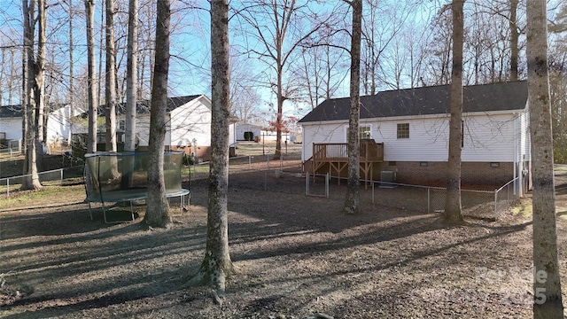 view of yard with a trampoline