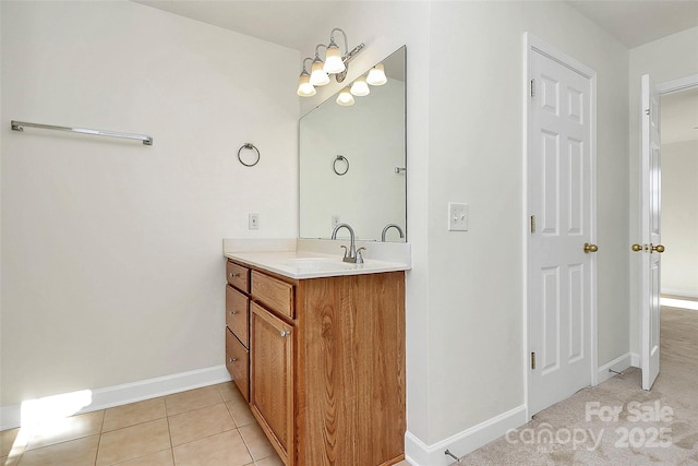 bathroom with tile patterned floors and vanity