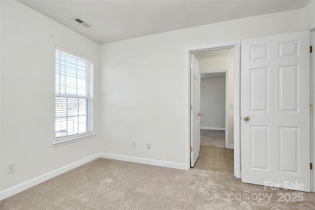 view of carpeted spare room