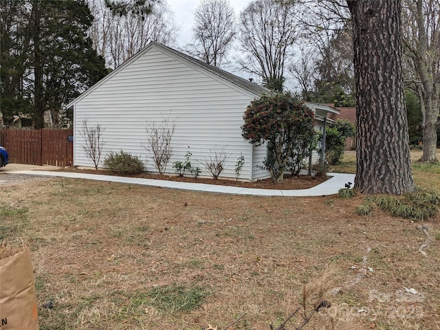 view of home's exterior featuring a lawn