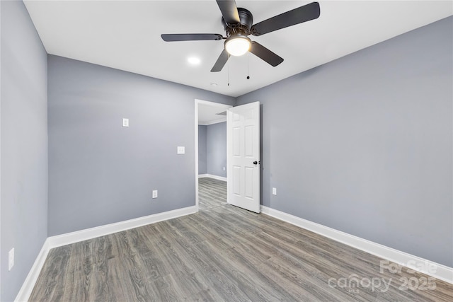 unfurnished bedroom with hardwood / wood-style floors and ceiling fan