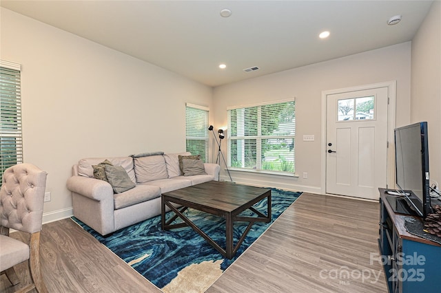 living room with dark wood-type flooring