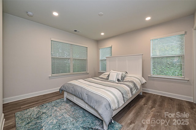 bedroom featuring dark hardwood / wood-style floors