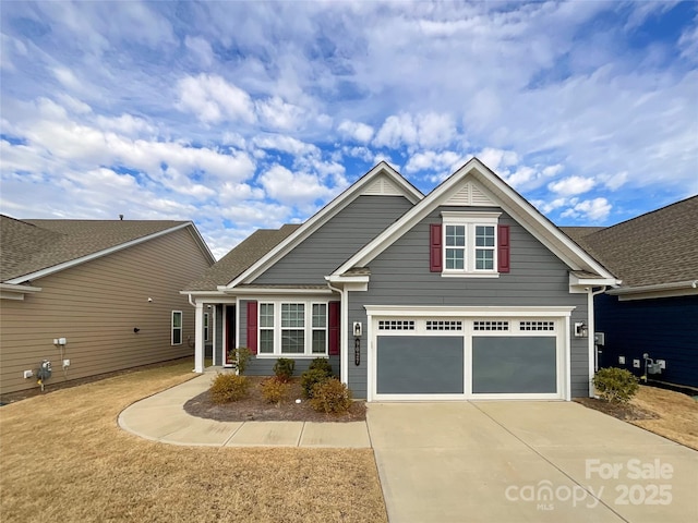 craftsman house with a garage