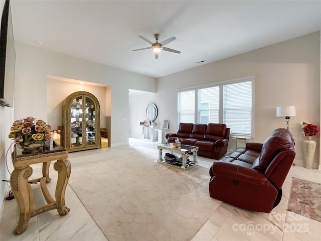 living room with ceiling fan