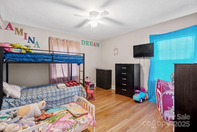 bedroom featuring ceiling fan and light wood-type flooring