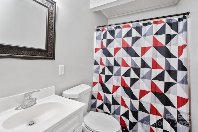 bathroom with toilet and sink