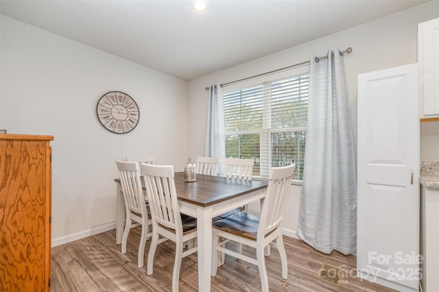 dining area featuring light hardwood / wood-style flooring