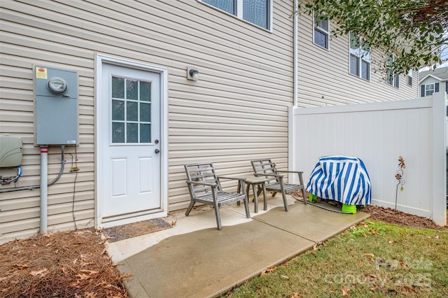 entrance to property with a patio area