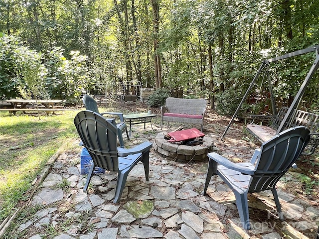 view of patio featuring a fire pit