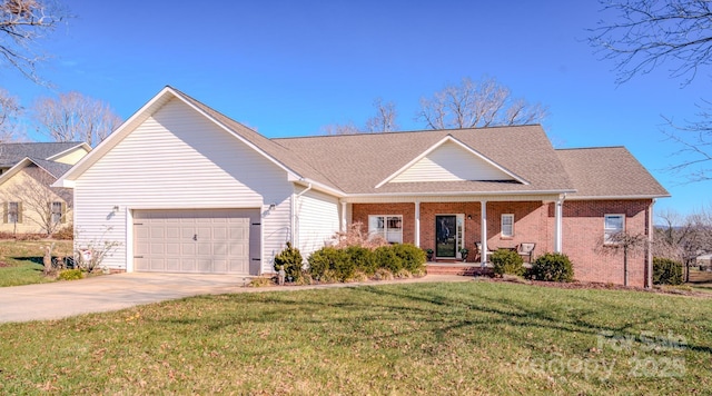 view of front facade with concrete driveway, an attached garage, covered porch, a front lawn, and brick siding