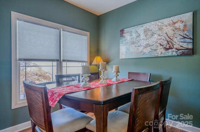 dining space with baseboards