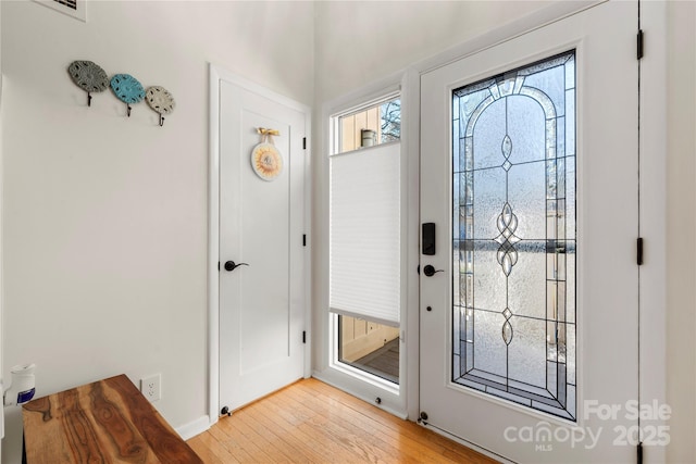 entrance foyer with light hardwood / wood-style floors