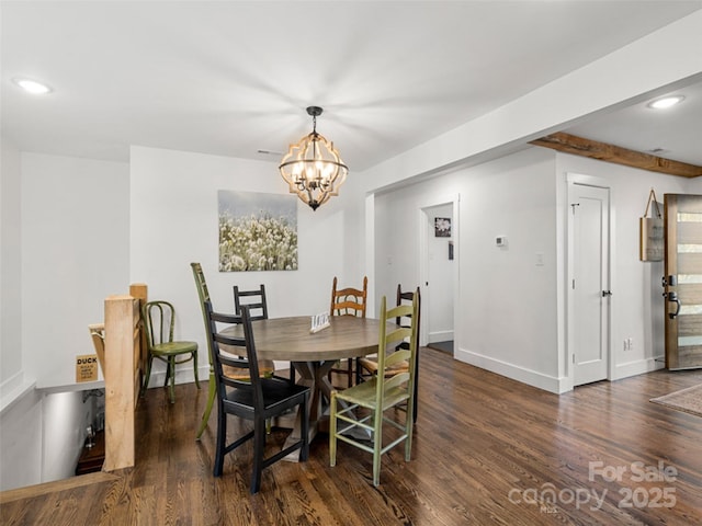 dining space with beamed ceiling, dark hardwood / wood-style flooring, and a chandelier