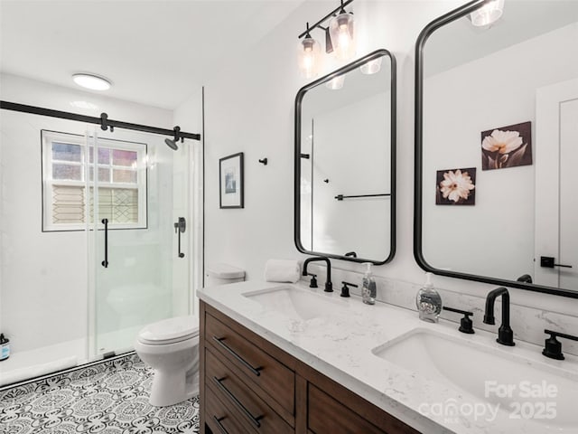 bathroom featuring toilet, vanity, tile patterned flooring, and walk in shower