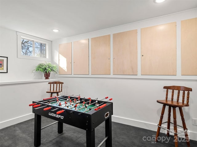 game room featuring dark carpet