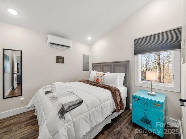 bedroom featuring electric panel, dark hardwood / wood-style flooring, a wall mounted AC, and vaulted ceiling