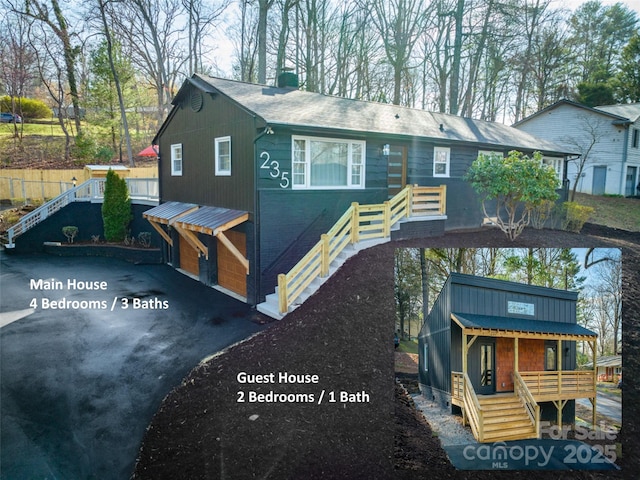 view of front of home with a garage and a porch