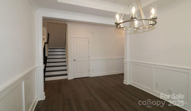 1136 Yellow Springs Dr, Huntersville, NC 28078 - unfurnished dining area featuring a chandelier, stairway, dark wood-style floors, and a decorative wall