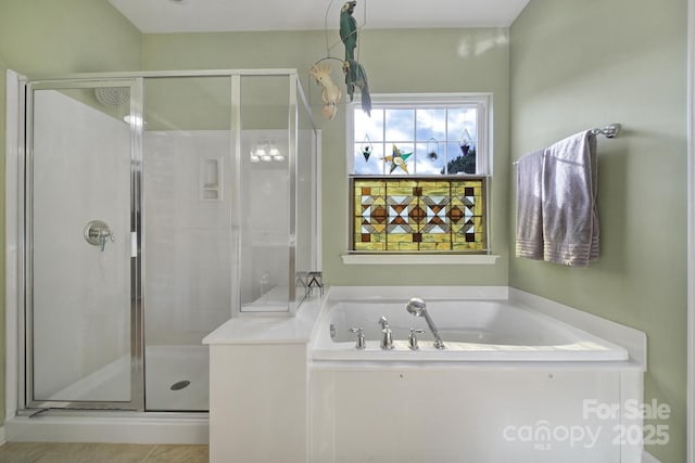 bathroom featuring plus walk in shower