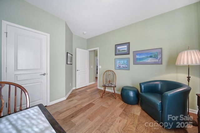 sitting room with light wood-type flooring