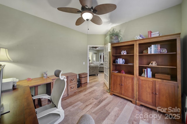 office space featuring ceiling fan and light hardwood / wood-style flooring