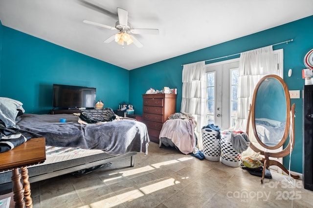 bedroom with ceiling fan and french doors