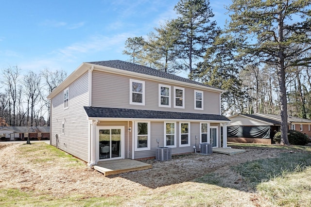 view of front of house featuring cooling unit