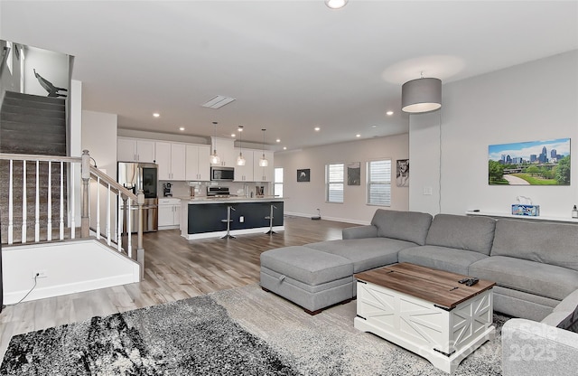 living room with hardwood / wood-style flooring