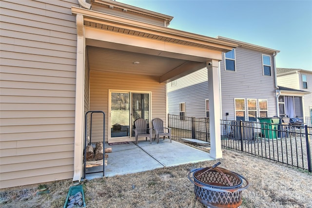 view of patio featuring an outdoor fire pit