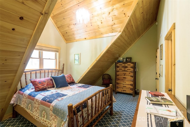 bedroom with vaulted ceiling and wood ceiling