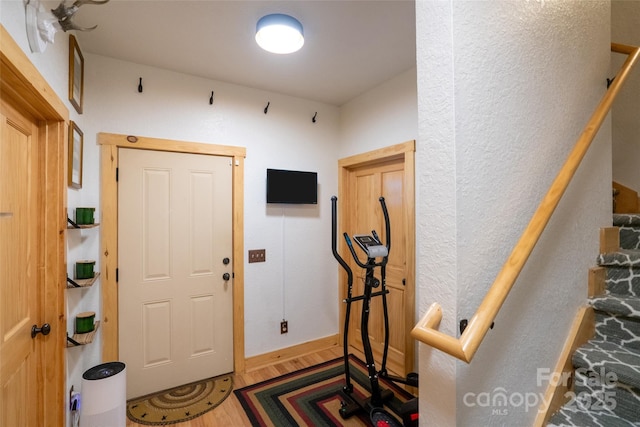 foyer featuring hardwood / wood-style flooring