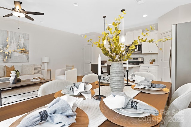 dining area with ceiling fan