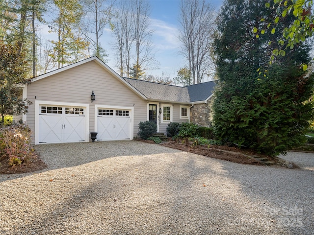 ranch-style home featuring a garage