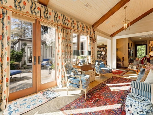 living room featuring a wealth of natural light, french doors, beamed ceiling, and wooden ceiling