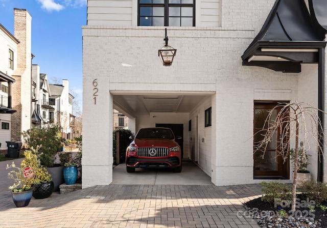 exterior space featuring a carport